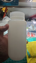 Agua bendita bottle.